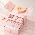 Silk satin makeup gift set open, showing the heart of soap roses and the drawers of makeup