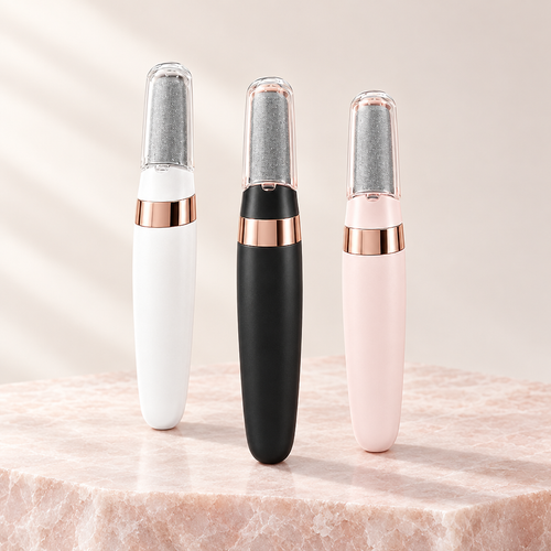 Rechargeable electric foot file in white, black and pink, standing on pale rose stone
